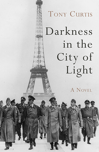This cover shows a black and white photo of Hitler and his officers walking in front of the Eiffel Tower during the French occupation. The text reads: Darkness in the City of Light. A novel. Tony Curtis.