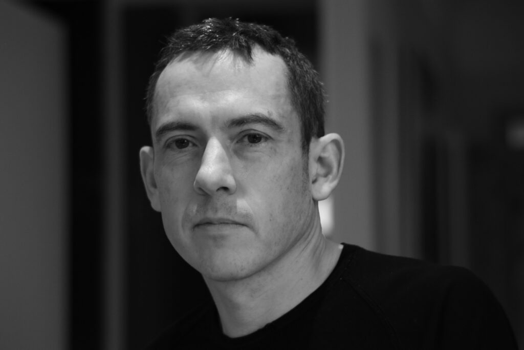 Black and white photo of Paul Deaton.