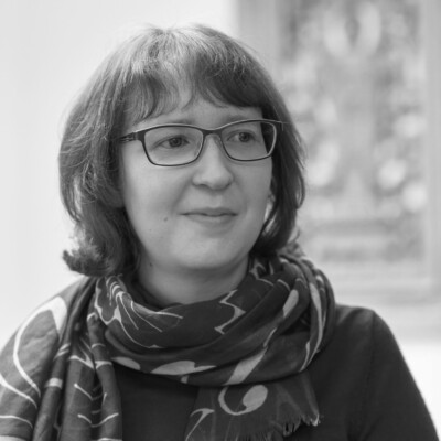 Black and white image of Rachel Carney.