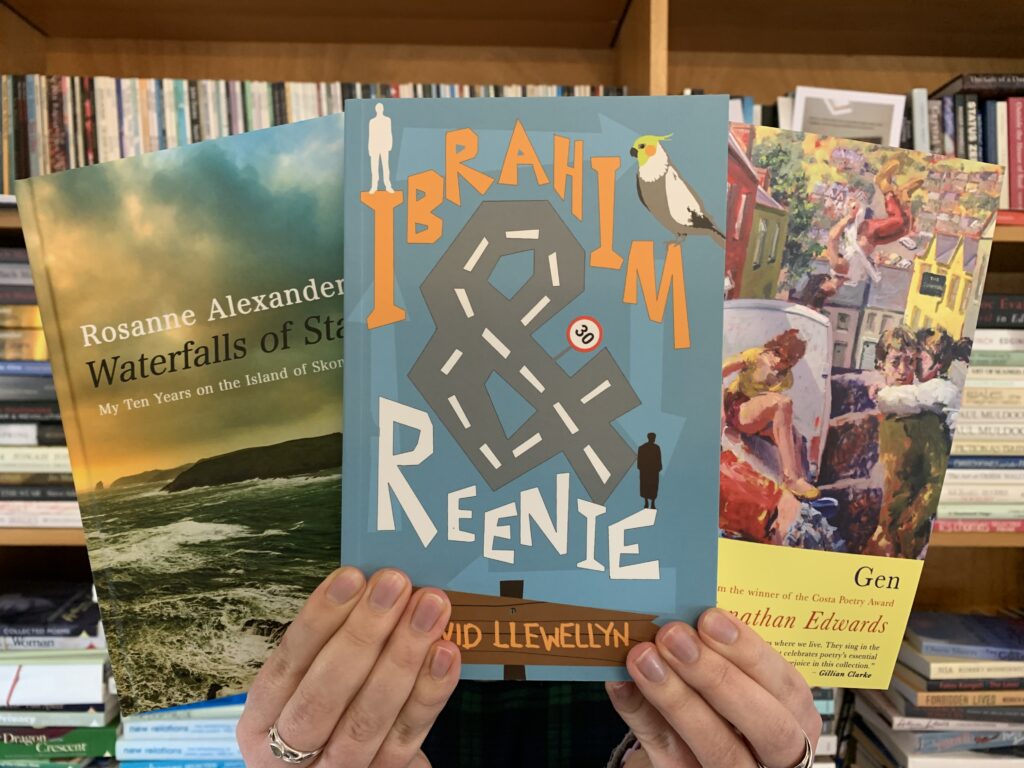 Copies of Waterfalls of Stars, Ibrahim and Reenie and Gen being held in the air.