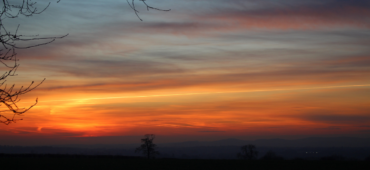 Photo of a stunning orange sunset in winter