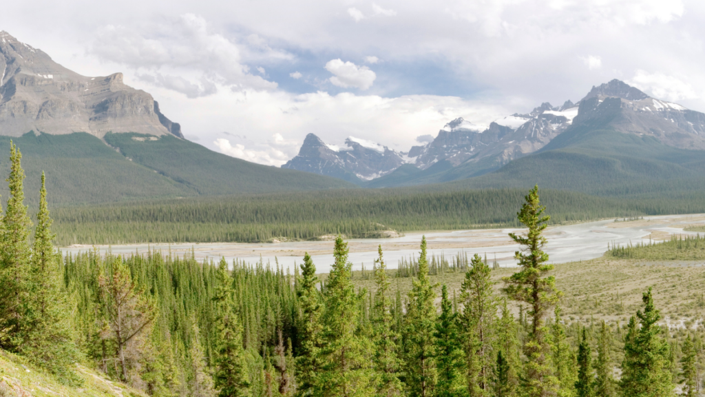 A mountain landscape beneath a cloudy sky