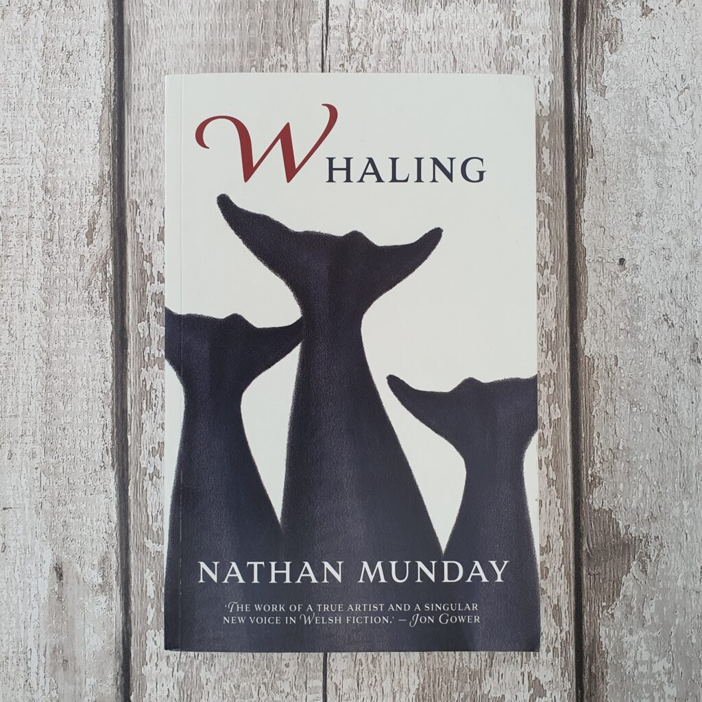 Copy of Whaling laid out against a wood effect background