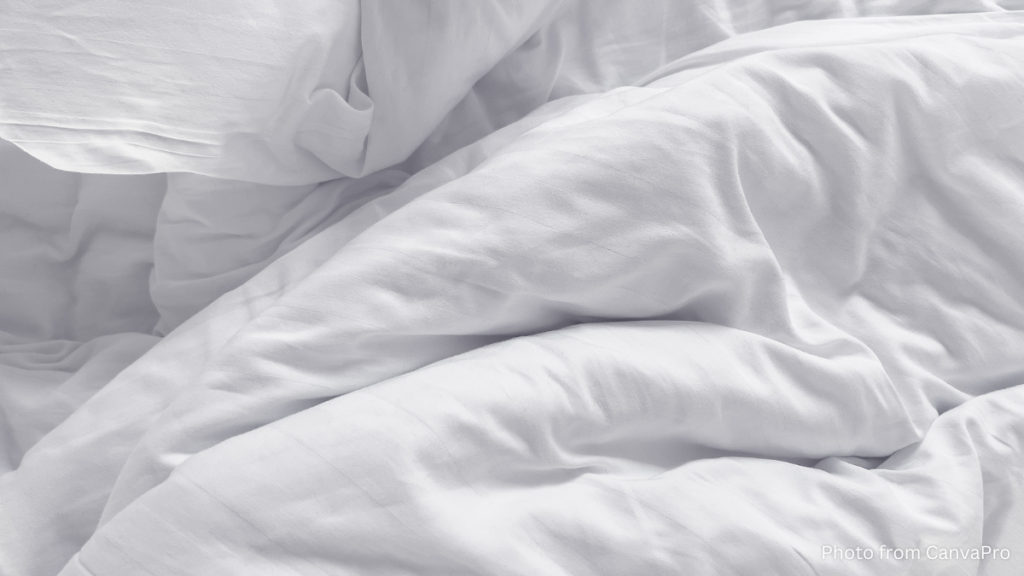 Photo of a crumpled white duvet