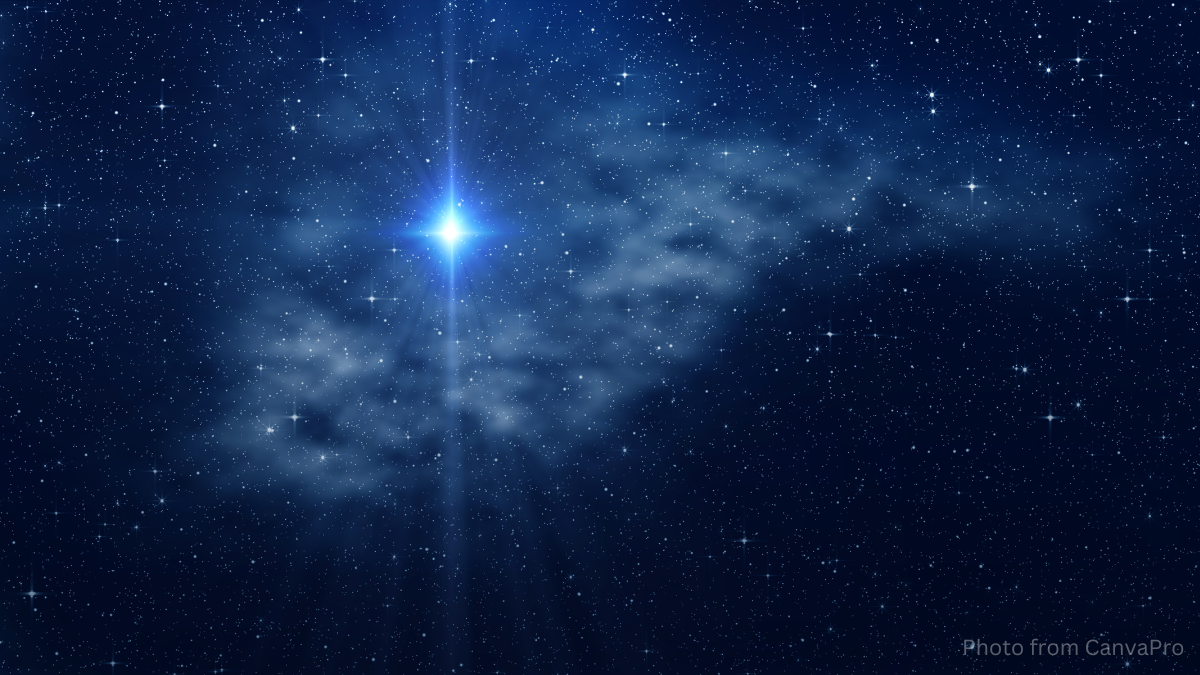 Photo of a bright star shining against a midnight blue sky