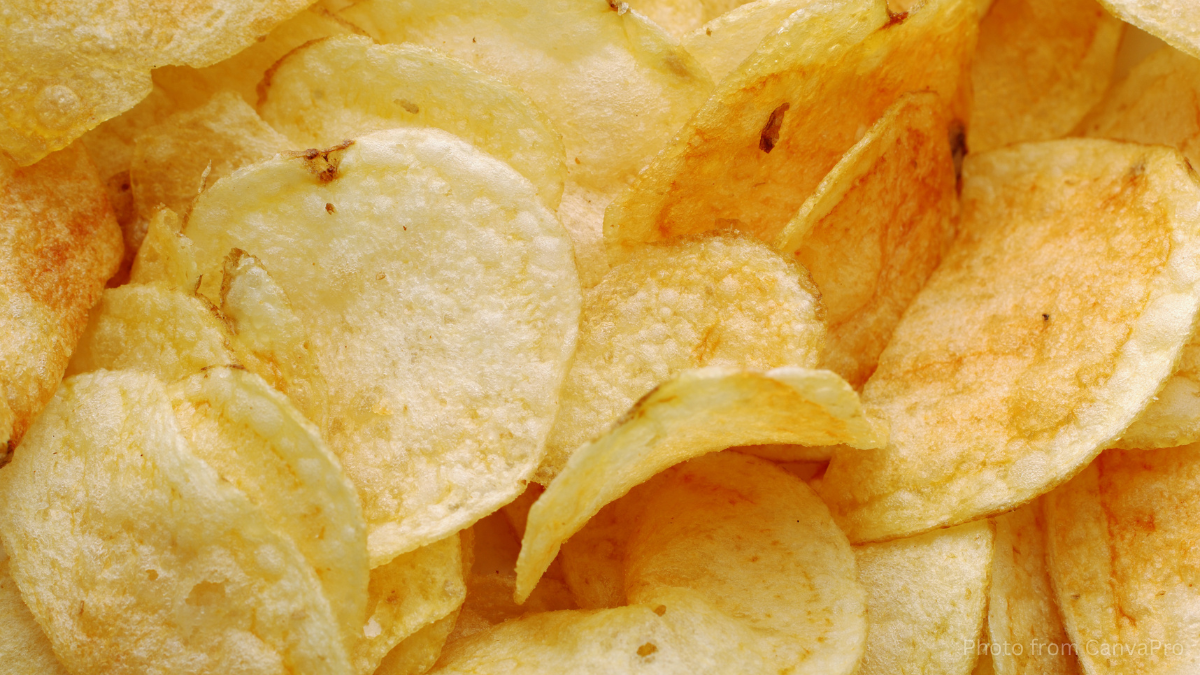 Close up photo of a pile of golden crisps