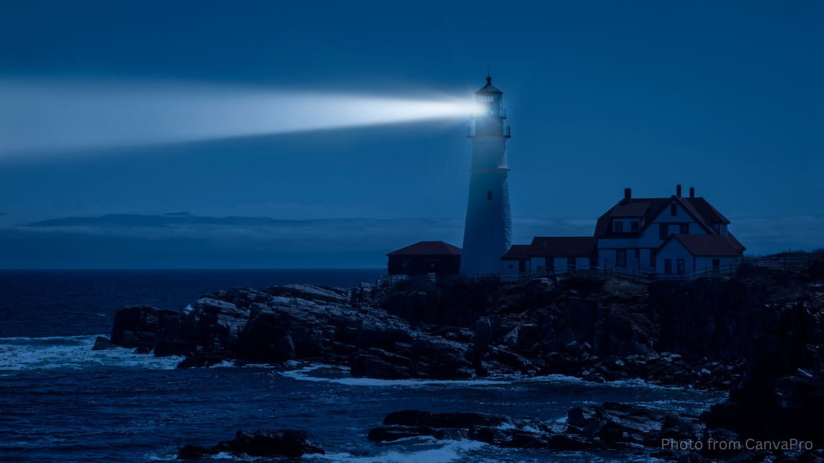 Photo of a light house flashing across the rock in the night.