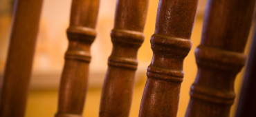 Close up photo of turned wooden spindles