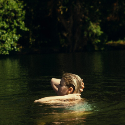 Photo of Megan Hayes swimming in a lake.