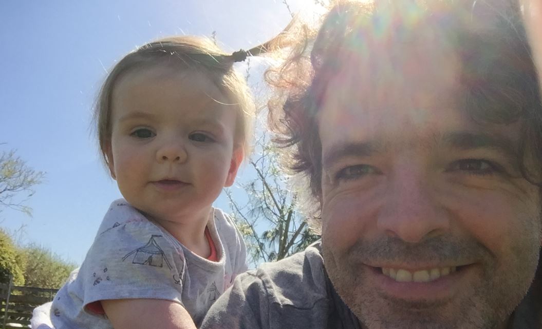 Photo of Eoghan Walls and his youngest daughter
